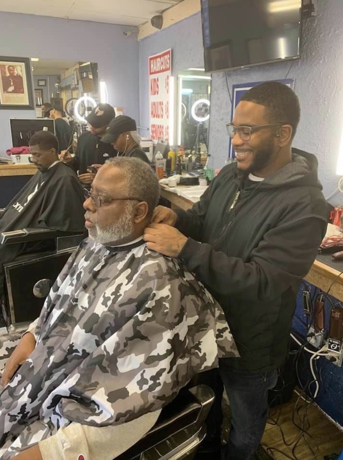 Students training at Networks Barber College