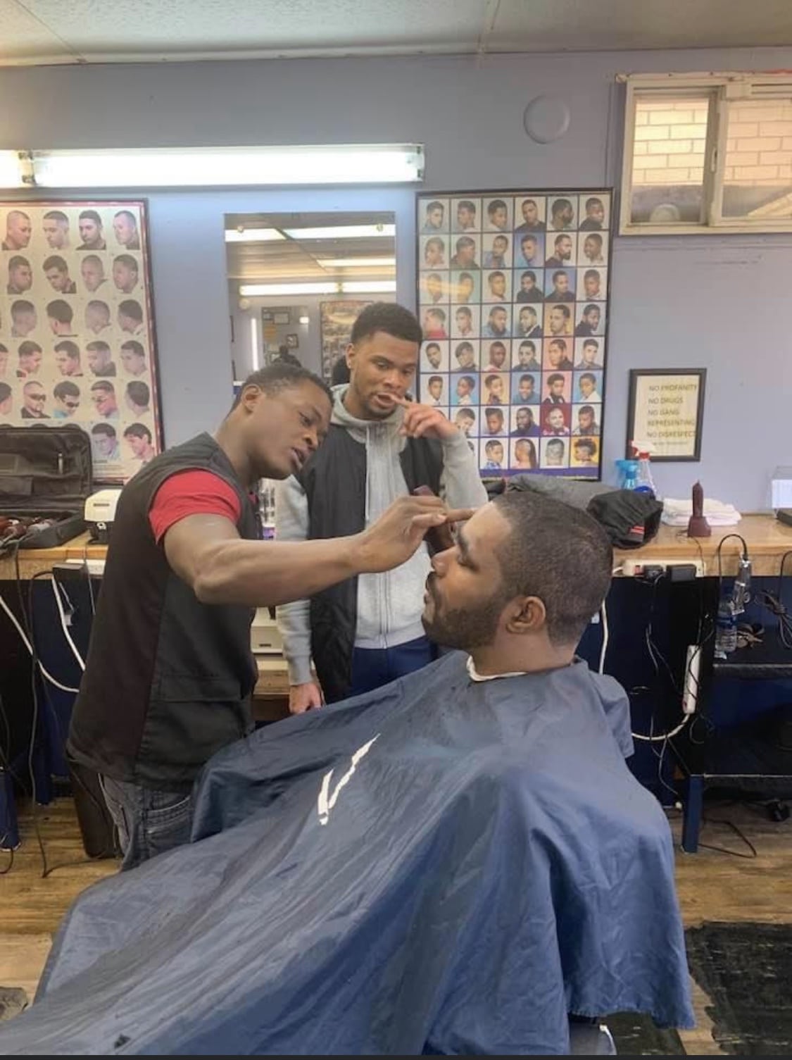 Students training at Networks Barber College