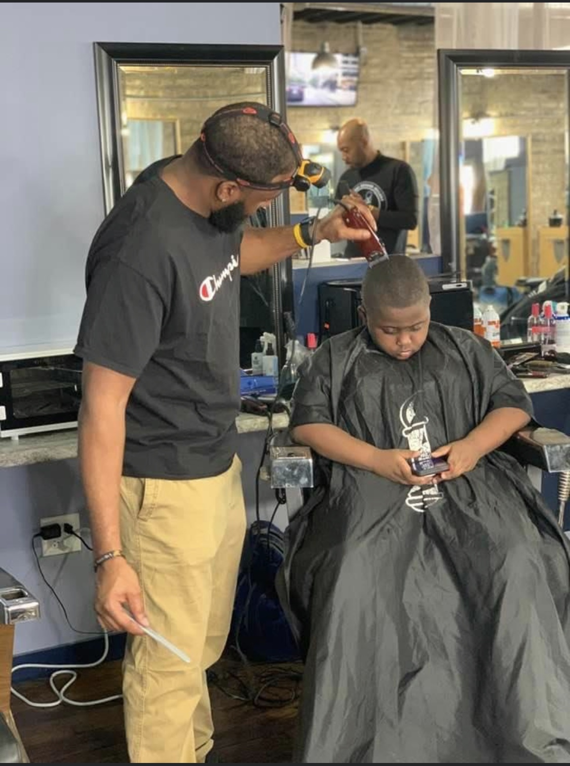 Students training at Networks Barber College