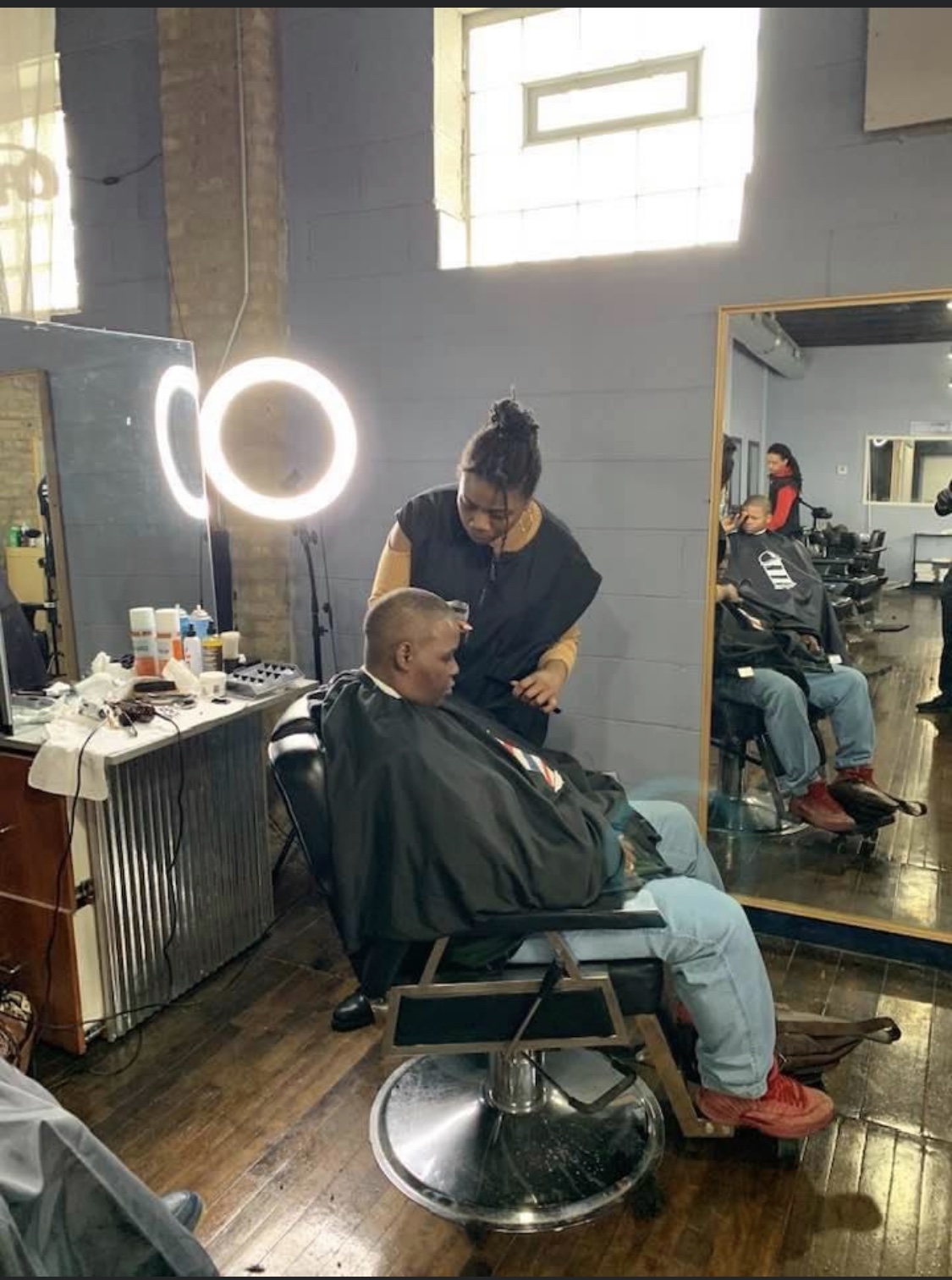 Students training at Networks Barber College